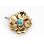 A continental diamond and turquoise flower head clip brooch, the gold petals, centred with a