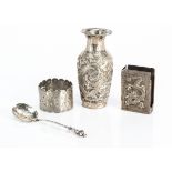Four vintage Chinese or Far Eastern items, including a dragon vase, 10.5cm high, dented rim, a