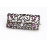 A late 19th Century early 20th century diamond and ruby panel brooch, of rectangular shape, with