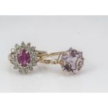 Two 9ct gold dress rings, including a ruby and diamond cluster example, ring size P, and an amethyst