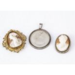 A shell cameo oval and seed pearl brooch, 4cm x 3.2cm, together with another shell cameo in