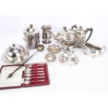 A small collection of silver and silver plated items, including two silver pierced dishes, a