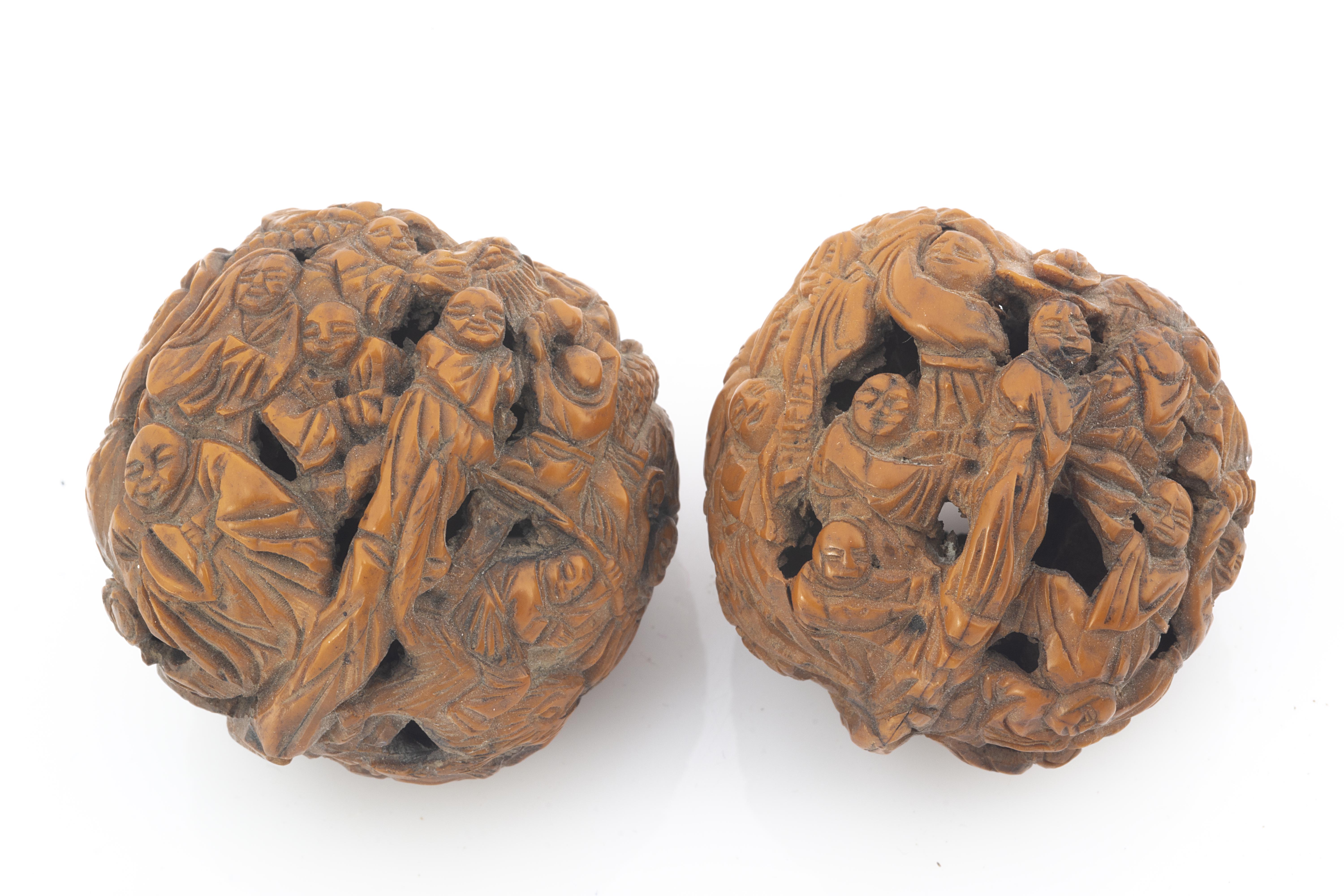 Three early 20th century Chinese carved walnut shells, the smallest with cord and tassels, each - Image 2 of 2