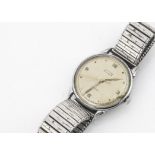 A vintage Tissot manual wind stainless steel wristwatch, 34mm case with gold coloured dial,