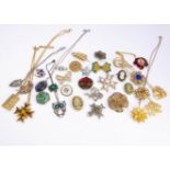 A small quantity of decorative costume brooches, including two Maltese crosses, together with