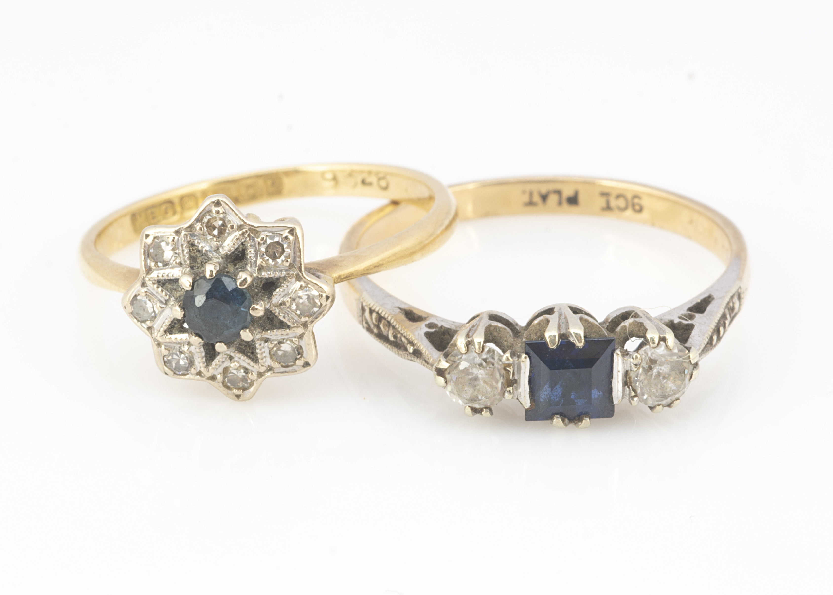An 18ct gold sapphire and diamond cluster ring, in star setting, ring size J, 2.1g, together with