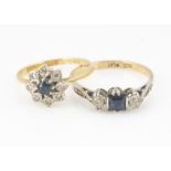 An 18ct gold sapphire and diamond cluster ring, in star setting, ring size J, 2.1g, together with