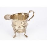 An Edwardian period Irish silver milk jug from West & Son, 8.5cm high, 4.45 ozt, Dublin 1903, on