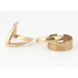 Three 9ct gold bands, including a wishbone example, ring size O, a wedding band, ring size V and