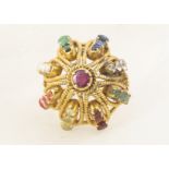 A large Indian basket ring, set with multiple coloured gemstones, including coral, pearl, turquoise,
