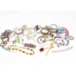 A large collection of costume jewellery, including bangles, beads, rings and other items