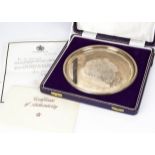 A 1970s silver limited edition commemorative salver, 20.5cm diameter, 8.9 ozt, celebrating the