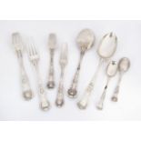 A part harlequin canteen of Victorian and later silver cutlery, in King's pattern, some pieces by