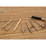 Eight Victorian and later fob and miniature pencils, AF, including an interesting cross shaped