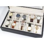 A collection of ten fashion watches presented in a watch collector's box