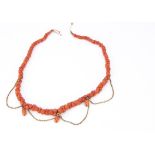 A 19th Century Italian coral and pinchbeck graduated necklace, the interlocking waisted links