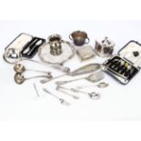 A collection of silver and silver plate flatware, including a plain George V silver card tray,