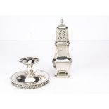 A George V silver sugar sifter and a bon bon dish, the sifter 19.5cm and 6.84 ozt, with a footed