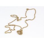 An 18ct gold fine curb link necklace, 26.5cm together, 5.9g