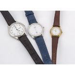 Three modern wristwatches, including a stainless steel Dunhill quartz, 33mm, in box, together with a