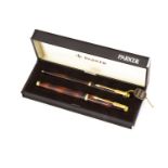 A Parker Laque pen set, brown mottled fountain pen with 14ct gold nib and biro in case, unused