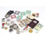 A small collection of modern British coins and various medals, mostly crowns and £2 coins, along