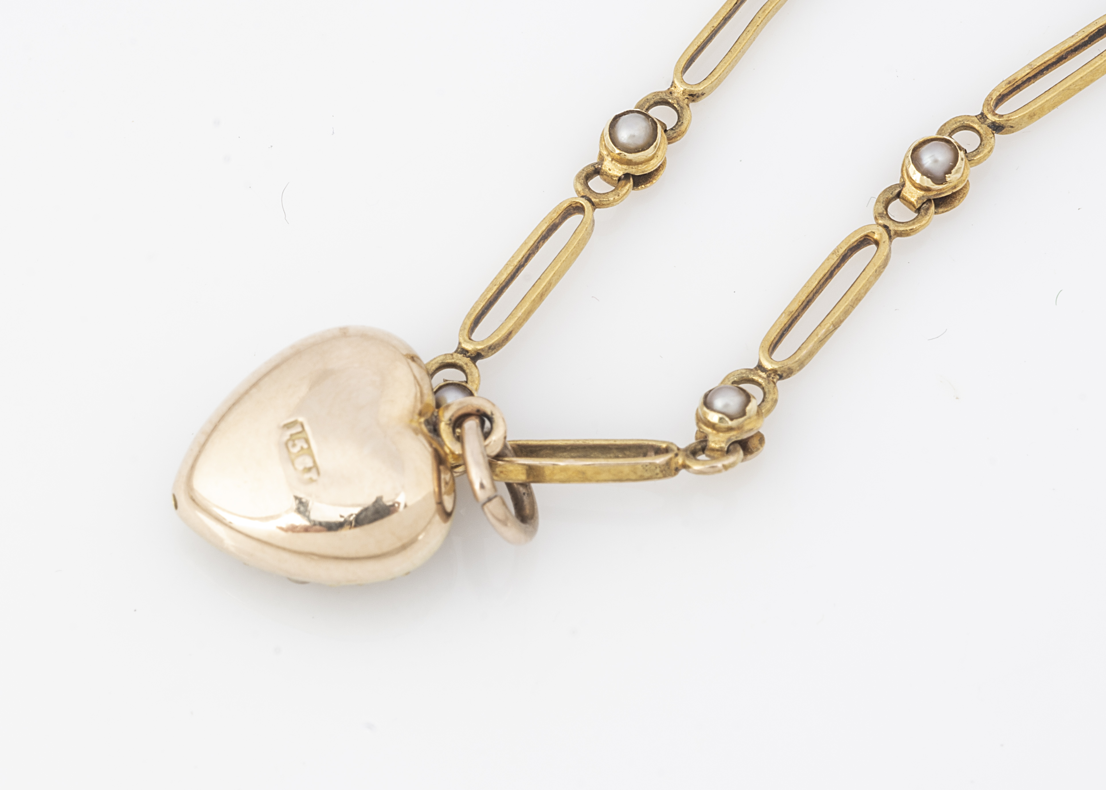 A 15ct gold seed pearl necklace, and heart shape drop, the oval links alternately set with seed - Image 2 of 2