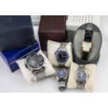 Five modern wristwatches, including a very large Diesel in box, a Seiko Kinetic with blue dial in