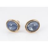 A pair of 14k marked, stained blue agate cufflinks, with snap backs, 11g