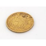 A Victorian gold half sovereign, dated 1863, shield back with young head, F-VF