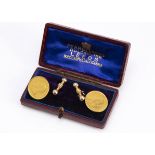 A pair of South African gold coin cufflinks, the half pond 1895 coins with silvered centred links