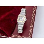 An early 21st century Cartier Tank bi-metal quartz lady's wristwatch, 24mm case, with cream dial