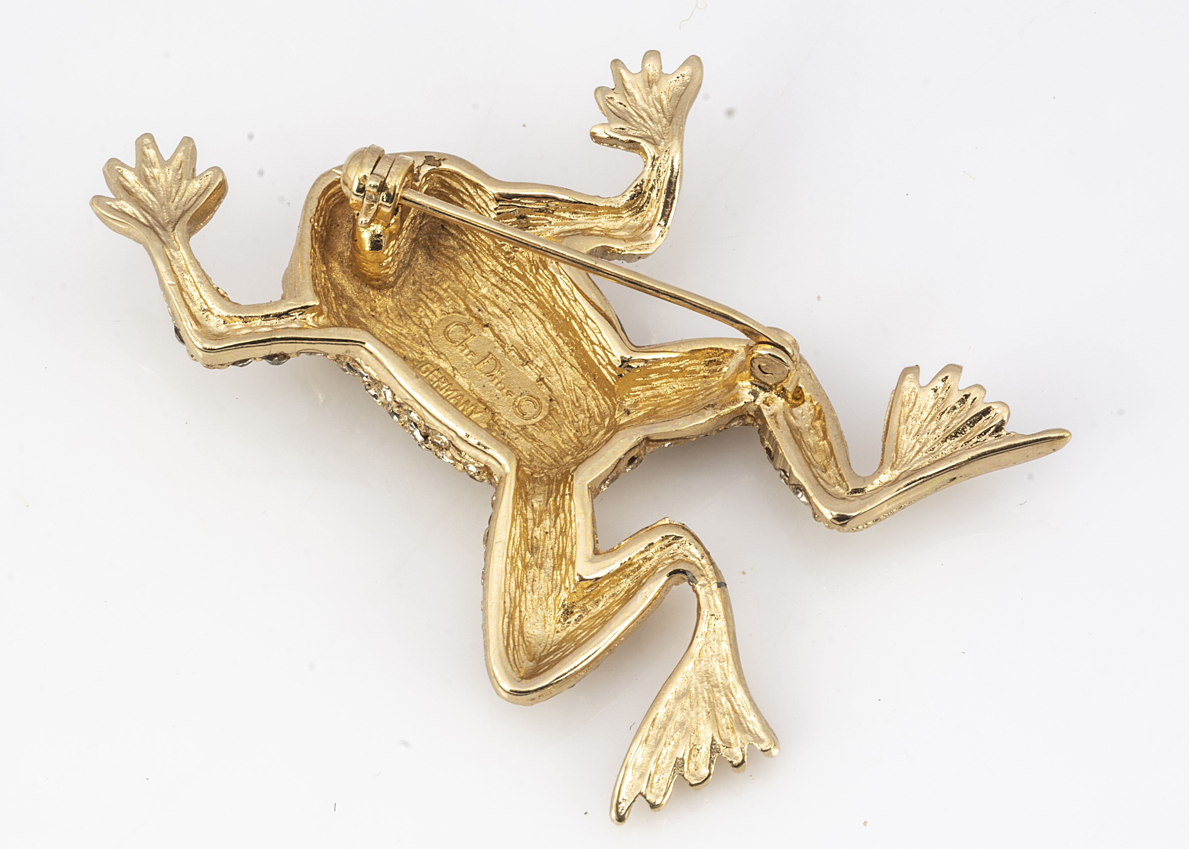 A Christian Dior frog brooch, encrusted with paste set gems, having pin back, 5cm x 3.5cm, 12.4g - Image 3 of 3