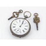 A late 19th century silver open faced pocket watch, 38mm wide, with two keys