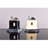 Two Ronson Octette table lighters, one in black, the other is cream, both with white metal