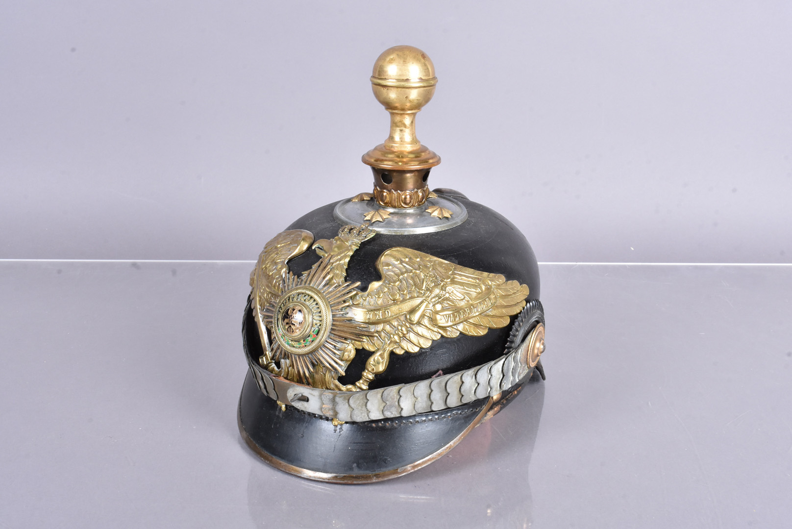 A Prussian Garde Officer's Private Purchase Pickelhaube, with brass ball top, with four star rivets,