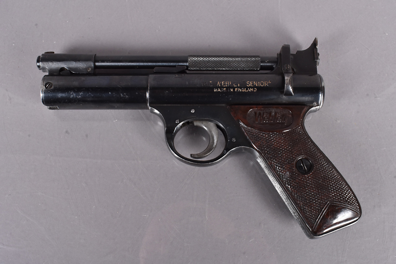 A Webley Senior Air Pistol, .177cal, serial 857, with brown bakelite hand grips, Face to Face