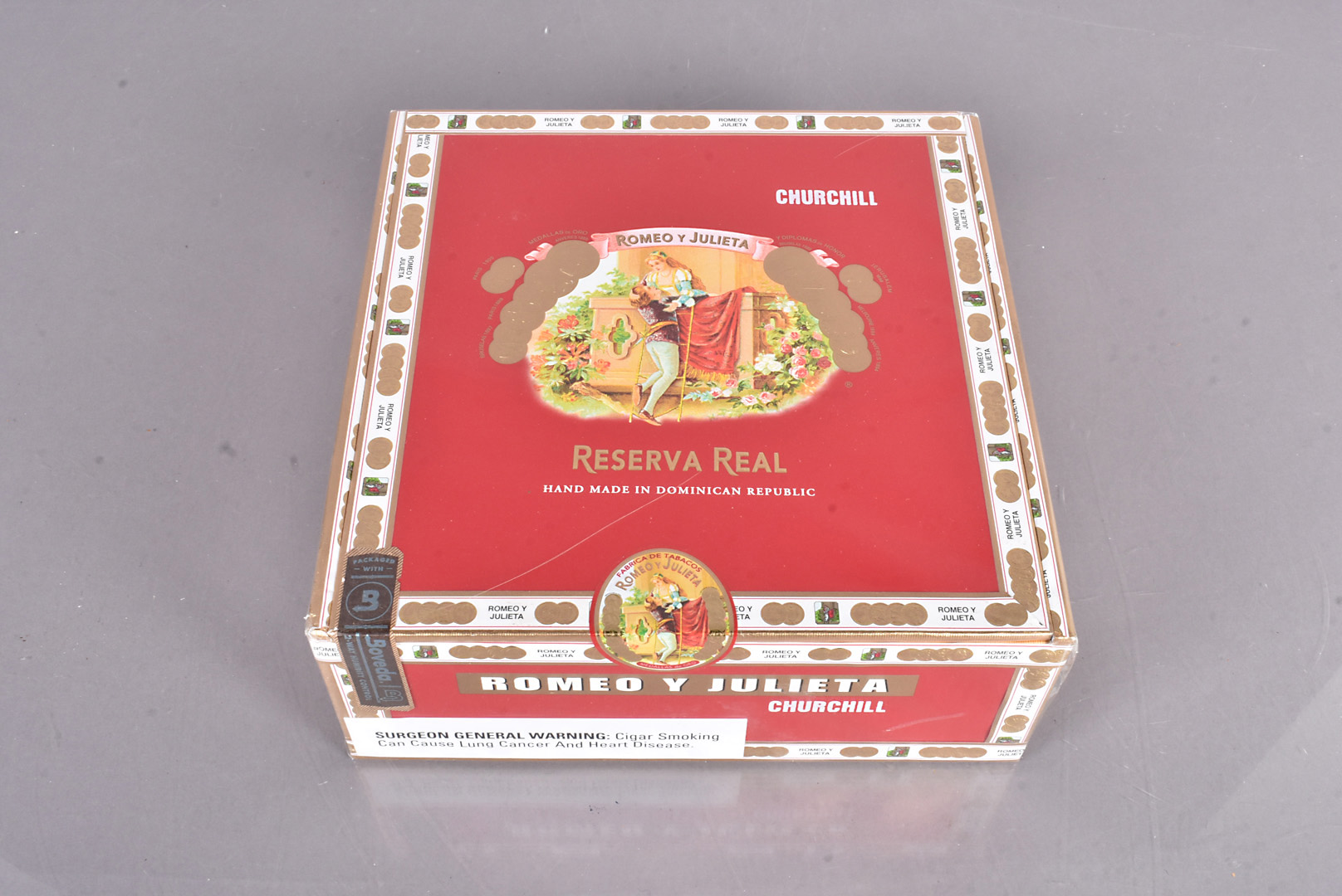 An unopened box of Churchill Reserva Real Romeo Y Julieta cigars, buyer needs to be 18 or older to