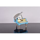 A Prince Piano Model II desk lighter, in the form of a Grand Piano, in blue and chrome, no postal