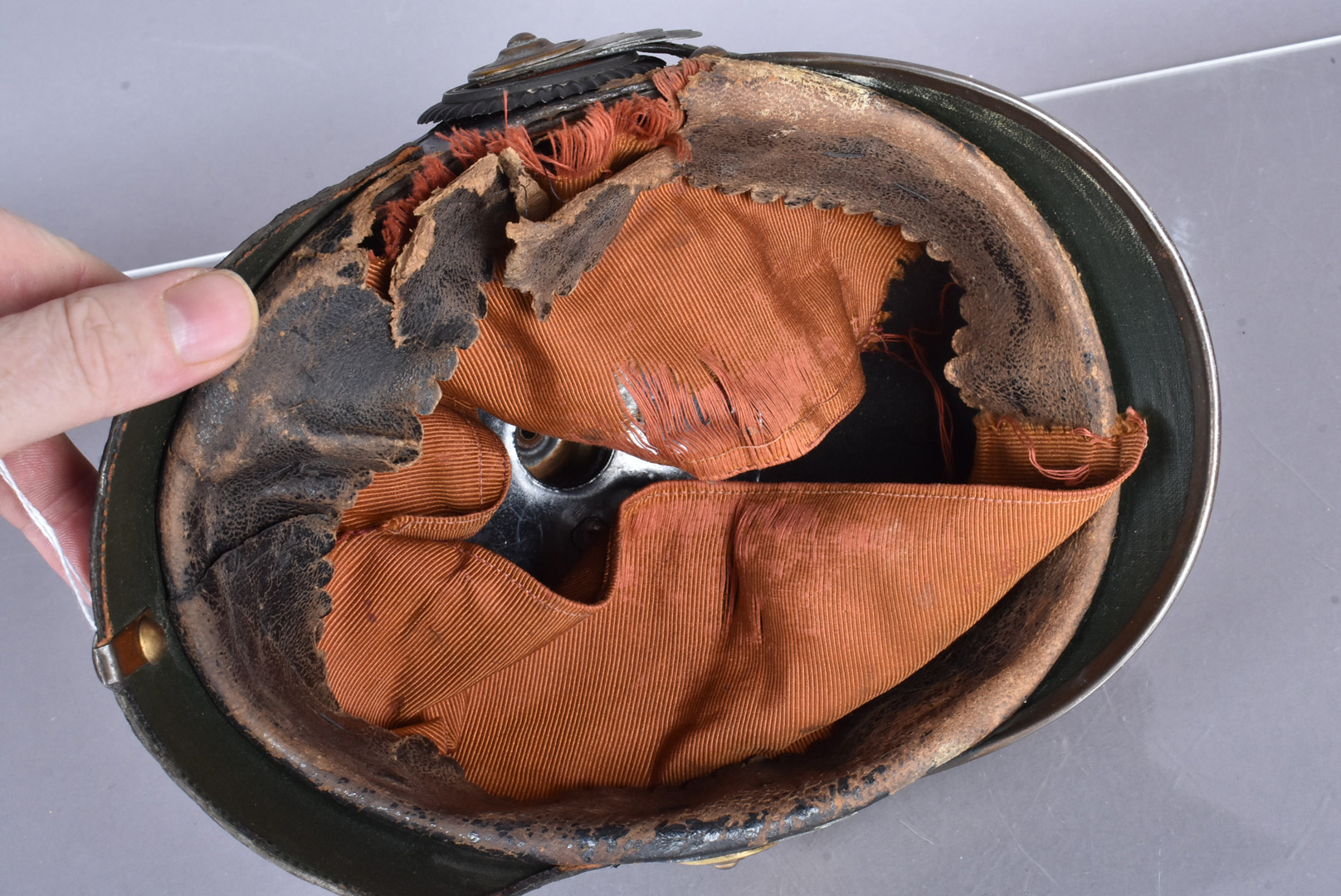 A Prussian Garde Officer's Private Purchase Pickelhaube, with brass ball top, with four star rivets, - Image 7 of 7