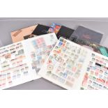 A collection of Victorian and Later British and Overseas stamps and presentation packs, including
