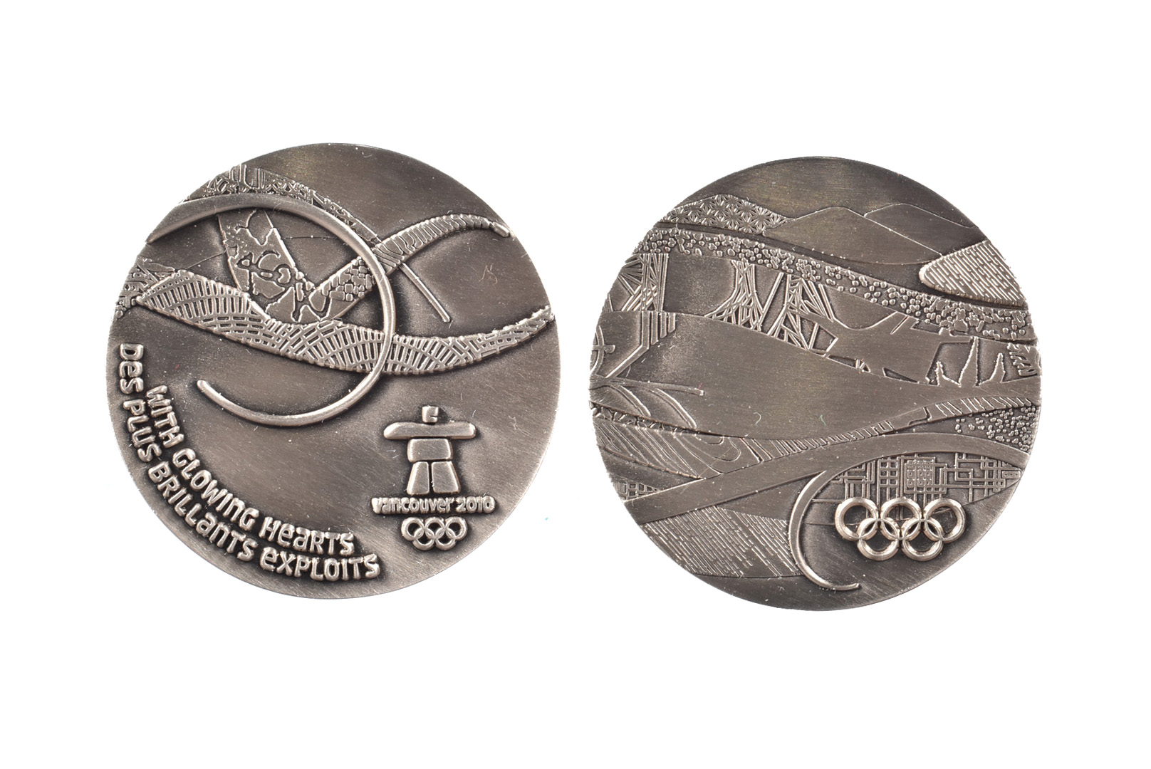 2010 Vancouver Winter Olympic Volunteers Participation medal, with motto 'With Glowing Hearts/Des