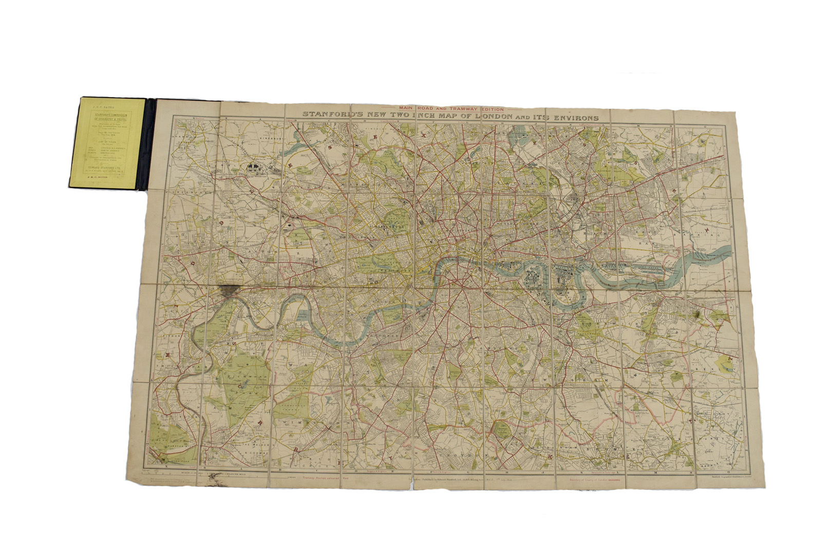 Stanford's New Two Inch Map of London and its Environs - Main Road and Tramline Edition, published