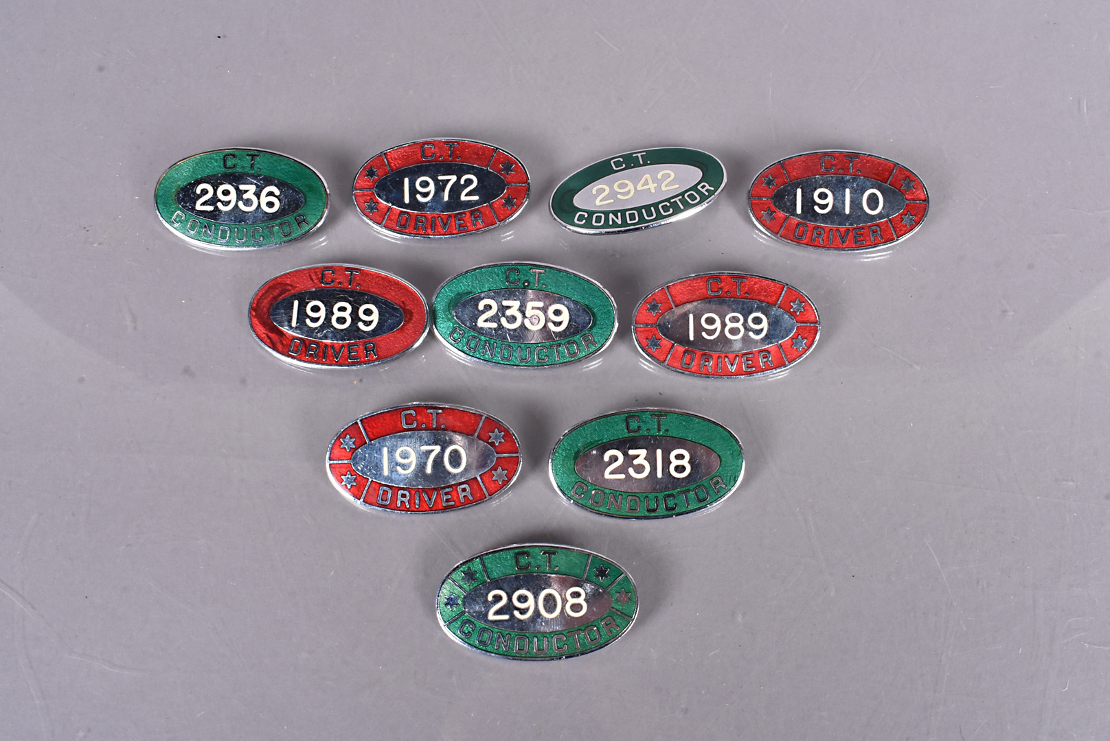 An assortment of Coventry Transport badges, for Drivers and Conductors, with various numbers to