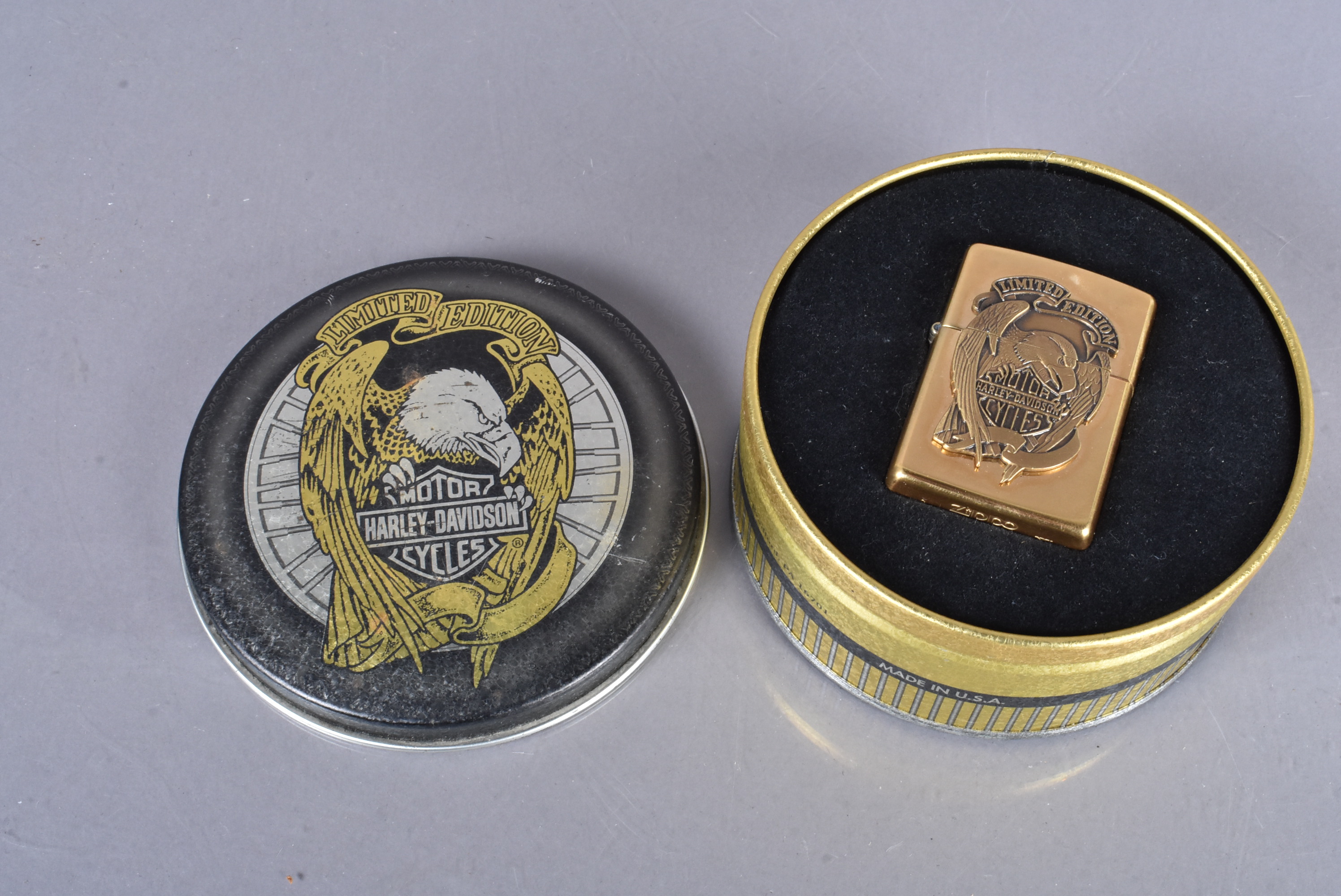 A Limited Edition Harley-Davidson Zippo lighter, in brass, with applied decoration, dated 1995, in