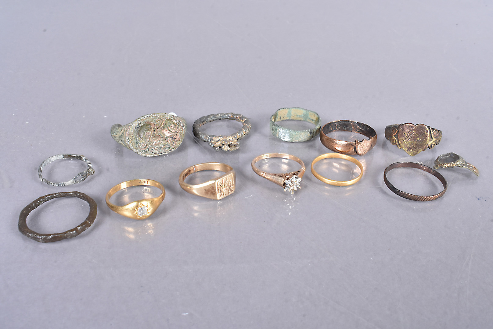 A collection of Roman and later rings, to include a Victorian 22ct gold band, 1.2g, an 18ct gold