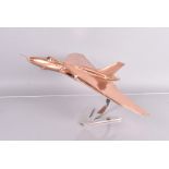 A handmade model of a Vulcan Bomber, in copper, made for the International Bomber Command Centre,