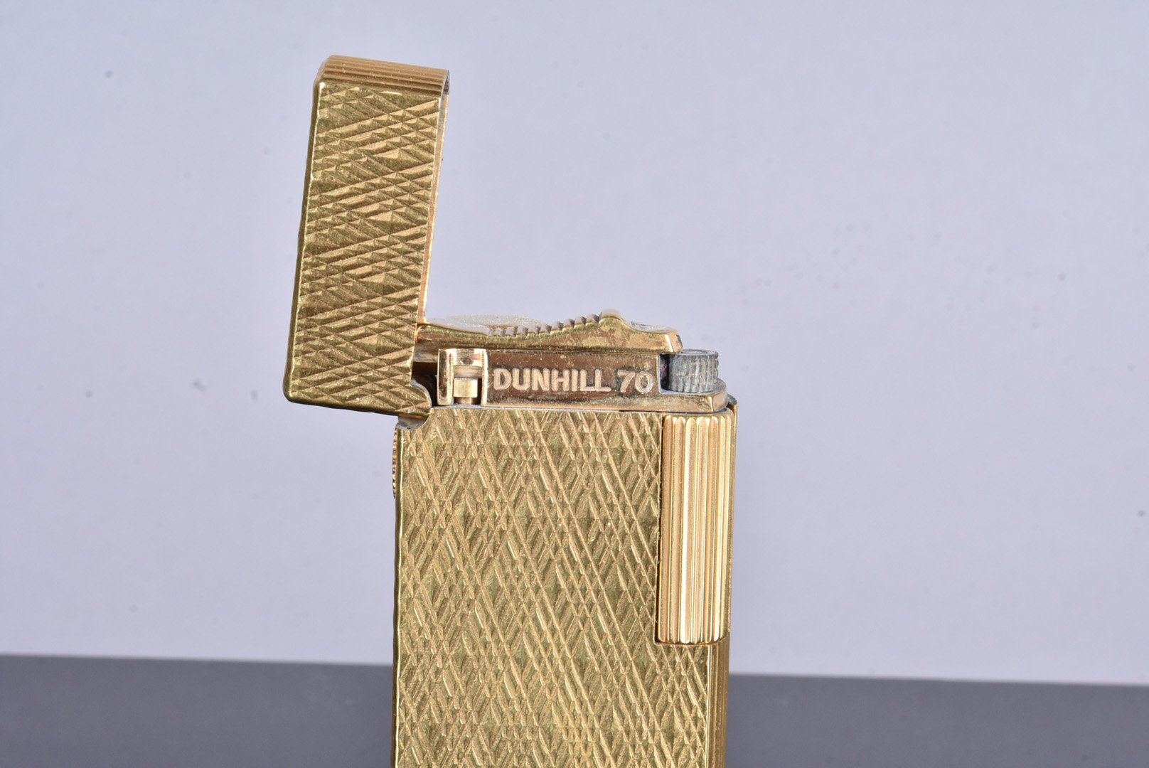 A Dunhill 70 gold plated lighter, serial CX467, also stamped C, and marked Patented, with engine - Image 3 of 6