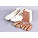 A small collection of cricket items, to include a pair of white cricket shoes, a pair of gloves,