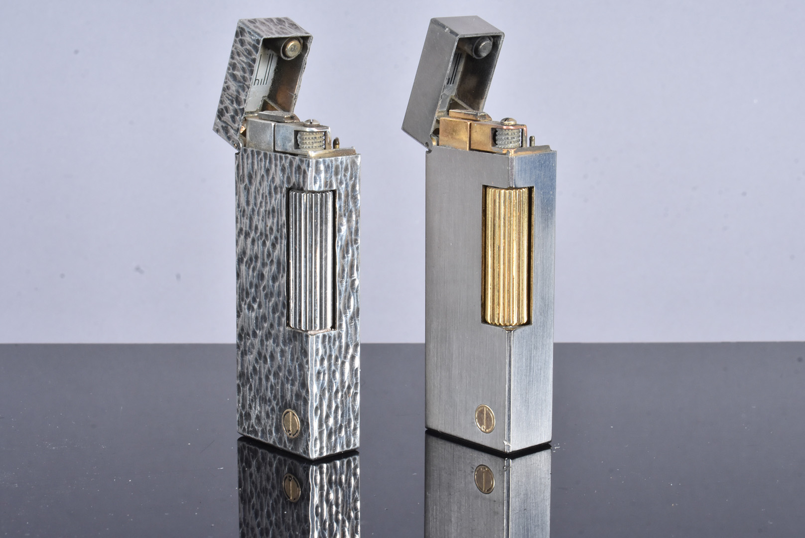 Two Dunhill Rollagas white metal pocket lighters, one with brushed design, the other with a hand - Image 2 of 4